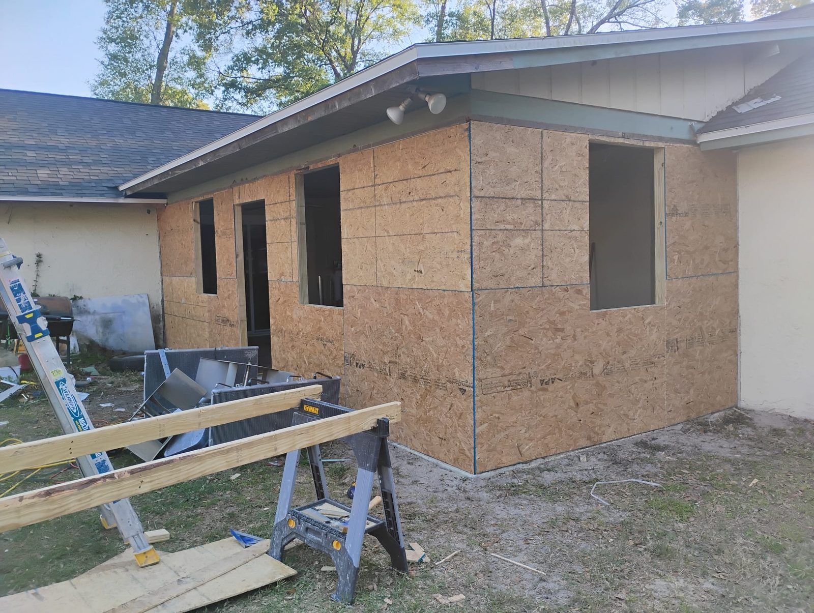 Before: Room addition stucco