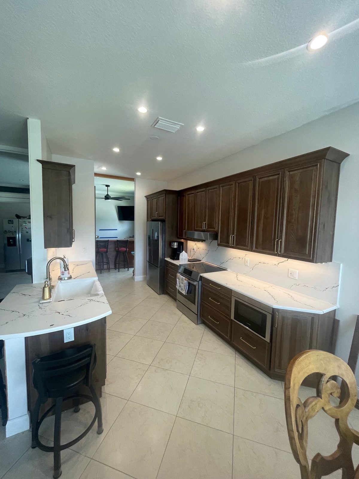 Kitchen remodel with custom cabinetry and quartz countertops